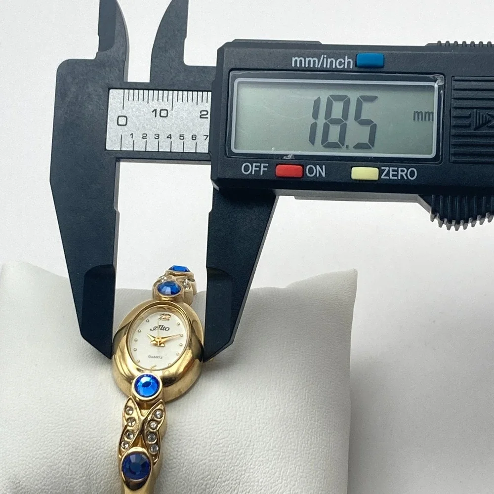 Alto Women's Watch 19mm Gold Tone Blue Crystals Cuff Oval New Battery 6.25